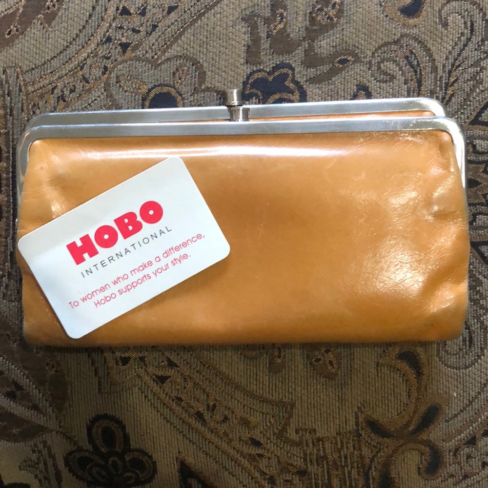 Hobo wallet. Can be carried as a clutch!